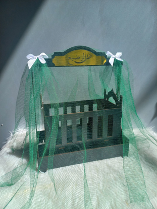 تصویر از گهواره توردار
